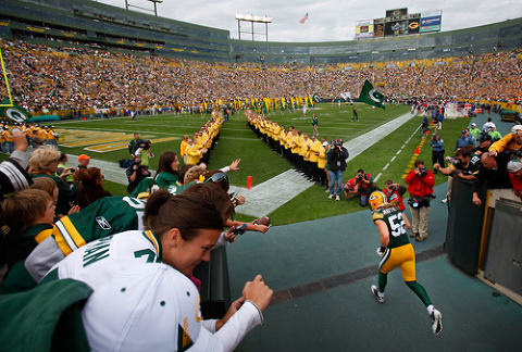 Green Bay Packers linebacker Clay Matthews stands on the field during warm  ups before the game