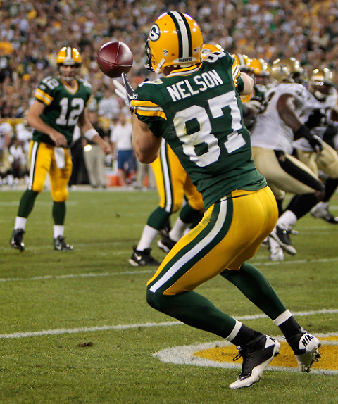 Rodgers throws 3 TDs as Packers beat Saints 42-34